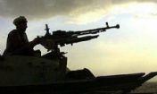 soldier with heavy artillery gun